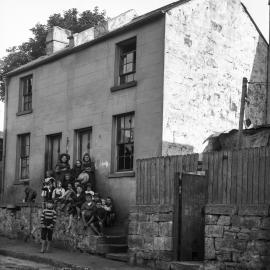 Glass Negative - Children on steps of terrace house in Cambridge Street The Rocks, 1901