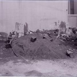 Glass Negative - Rubbish at rear of premises on Dalley Street Sydney, 1922