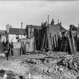 Glass Negative - Demolition site and houses on East Street Surry Hills, 1922