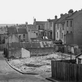 Glass Negative - Vacant block and buildings in Langley Lane Darlinghurst, 1937