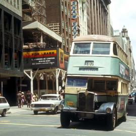 Bus and cars in Castlereagh Street near Hunter Street Sydney, 1972
