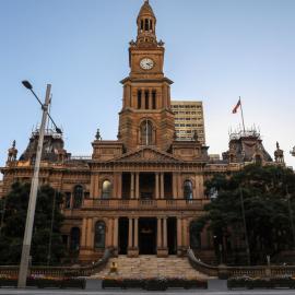 A man sits on Sydney Town Hall steps during Covid-19 pandemic, 2020