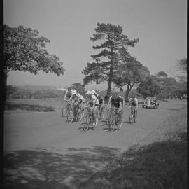 Leading Empire Games cycling group, Centennial Park, 1938
