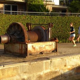Jogger passing an old winch on the Blackwattle Bay Park foreshore path, Glebe, 2007