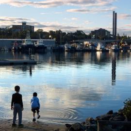 Two children at the water's edge at Federal Park, Glebe, 2013