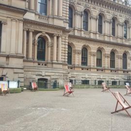 Empty sunchairs in a usually occupied Sydney Square, COVID-19 pandemic, 2020