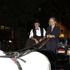 Close up of driver and Lord Mayor seated in a horse-drawn carriage, Martin Place Sydney, 2003