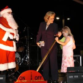 Lord Mayor and child light Christmas tree as Santa watches, Martin Place Sydney, 2003