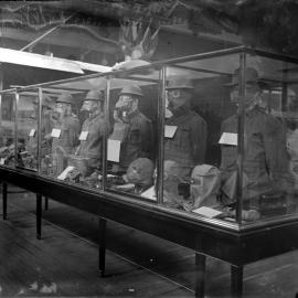 Pavilion with gas masks on manequins exhibit, circa 1920