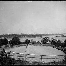 View across Sydney Harbour with Navy ships, Garden Island Sydney, circa 1930