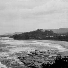 A cluster of small huts and houses by the sea, unknown location, no date