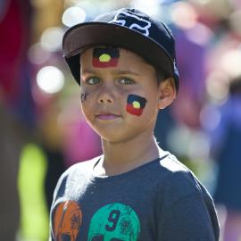 Child with flag facepaint NAIDOC in the City, Hyde Park, 2013