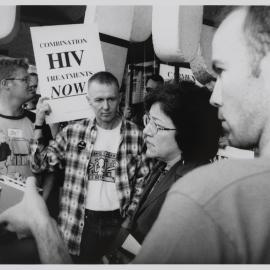 Carmen Lawrence surrounded by protesters about HIV treatment, 1995