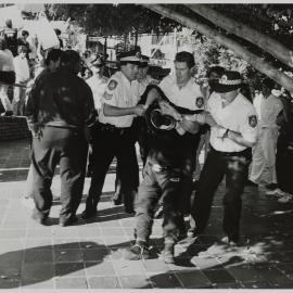 Police and protester, Kings Cross, 1990