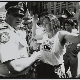 Police officer and protester, Belmore Park Haymarket, 1991