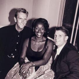 Marcia Hines with birthday party attendees, 1997