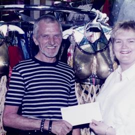 Ron Muncaster and Bev Lange at cheque handover event, no date