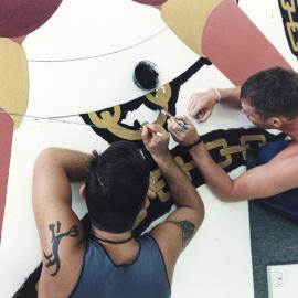 Painting murals, Leather Pride event, unknown location, 2000
