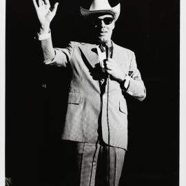 Fabian Lo Schiavo as Reverend Oral Riches, ACT UP benefit, 1990