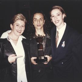 Paul Capsis receives an award at Mardi Gras Awards Night, Sydney Town Hall, George Street Sydney, 1995