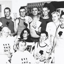 Sydney Gay and Lesbian Mardi Gras parade staff with merchandise, Erskineville Road Newtown, 1996
