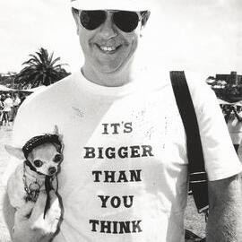 Attendee with dog, Mardi Gras Fair Day, Jubilee Park Glebe, 1994
