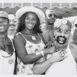 Marcia Hines helps at Mardi Gras Fair Day stall, Jubilee Park Glebe, 1997
