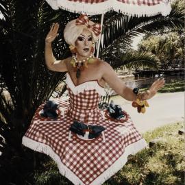 Drag queen Crispin Rice with picnic table dress, Mardi Gras Fair Day, Victoria Park Camperdown, 1998