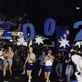 Sydney Gay Games promoters in Sydney Gay and Lesbian Mardi Gras Parade, Oxford Street Darlinghurst, 1999