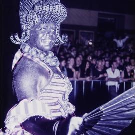 Parade entrant in Sydney Gay and Lesbian Mardi Gras Parade, Flinders Street Darlinghurst, 1996