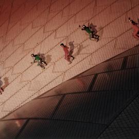 Aerial performers on shell of Sydney Opera House during New Years Eve, Bennelong Point Sydney, 1999