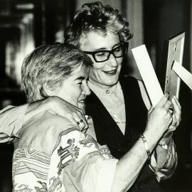 Dawn O'Donnell with an attendee at a Lesbian Space Project fundraiser event, 1993