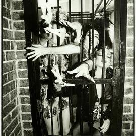 Drag queen Cindy Pastel and fellow drag queens act out film Caged Heat, 1991