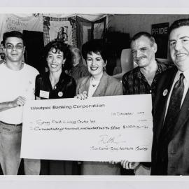 South Eastern Sydney Area Health Service present cheque to People Living with HIV/AIDS, 1997