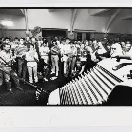 Squeezebox sing-along for the opening of the PRIDE Club on Flinders Steet Darlinghurst, 1990