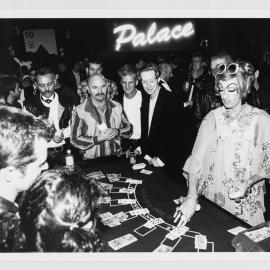 Vanessa Wagner deals for a card game at the Stonewall Ball's casino, 1996