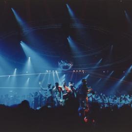 Dancing on raised platform at PRIDE party, 2000