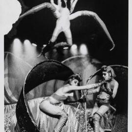 Performers in a heart silhouette at a PRIDE party, 1997