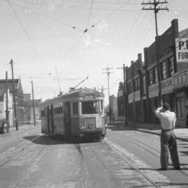 Streetscape with tram on Botany Road Rosebery or Alexandria, 1960