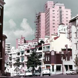 Streetscape with terrace houses and apartments, Paddington, circa 1963-1975
