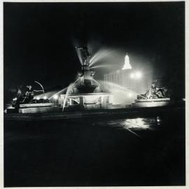 The Archibald Memorial Fountain illuminated at night, Hyde Park Sydney, circa 1937-1938