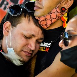 Three people at Black Deaths in Custody protest, Sydney, 2021