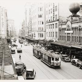 View looking north along George Street with trams, Sydney, circa 1938