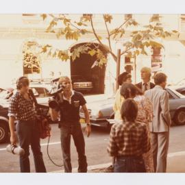 Media news crew outside of the Red Cross Blood Bank, 1983