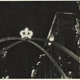 Arch decoration at night during royal visit of Queen Elizabeth II, Martin Place Sydney, 1954