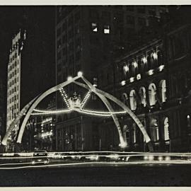Arch decoration at night during royal visit of Queen Elizabeth II, Macquarie Street Sydney, 1954