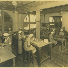 Atkinson's Perfume Factory, interior view with staff, Kent Street Sydney, circa 1931