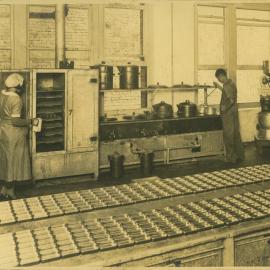 Atkinson's Perfume Factory, interior with workers, Kent Street Sydney, 1931