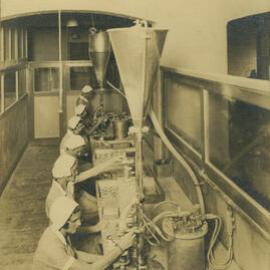 Atkinson's Perfume Factory, interior view with staff, Kent Street Sydney, circa 1931