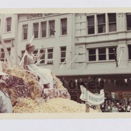 Woman on float, Waratah Festival Parade, George Street Sydney, 1969